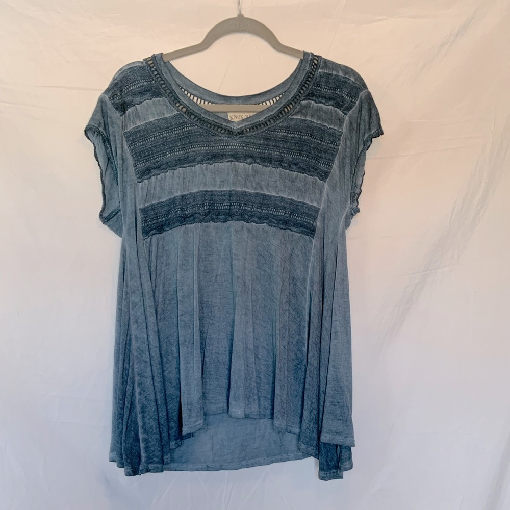 flowy blouse with lacy detail